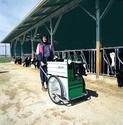 Woman using a green and white caf-cart