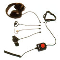 The accessories pictured are a corded speaker, a throat mic, earphone, headphone, push-to-talk box, and interface cable.