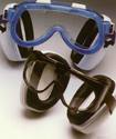 Two of the goggles showing their combination eye-protective and ear-protective components.