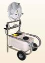 Resting on the horizontal portion of a L-shaped, two-wheel cart-type frame is the chilling unit, and bolted to the vertical portion is the large misting fan.