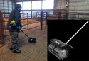 Bearded man with black knit cap-black jacket-work pants & boots sweeping brick floor of pole-barn with green & black powered rotary broom. Lower right inset of Makita rotary broom head with handle in black & white