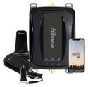 Black signal booster with integrated amplifier, magnetic roof antenna, DC power supply, and cell phone.