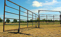 2 free-standing portable fence panels out in a field