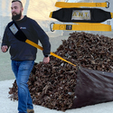 Man using A.N.T to drag tarp full of leaves