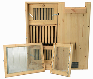 Drebbieville beehive. Large, rectangular box sitting vertically, with slide-out screens for bees to build their hive. Also has door to cover hive screens..