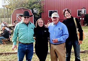 Standing together in front of barn are VC Executive Director Michael O’Gorman, North Carolina AgrAbility Project Director Crystal Kyle, National AgrAbility Project Director Bill Field, and FVC Deputy Directory Sarah Da­chos