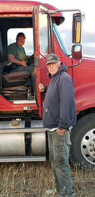 Mike with son Tyson in truck cab